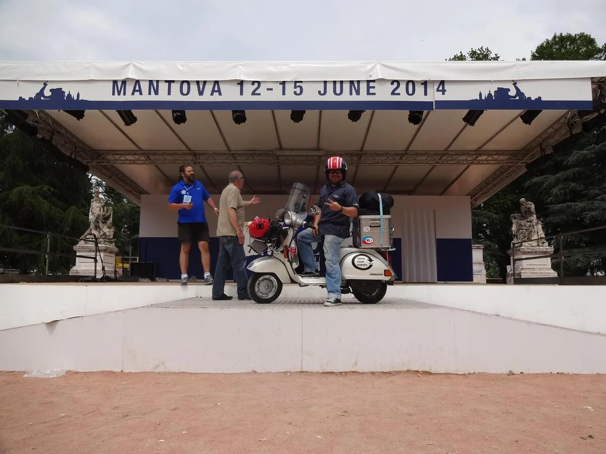 Markus André Mayer with Madalina Vespa P200E on stage at Vespa World Days Mantova Italy 2014