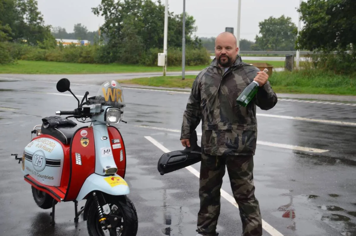 Scomadi TL125 world record finish Padborg Denmark 1691 km 10 countries 23.5 hours 2015