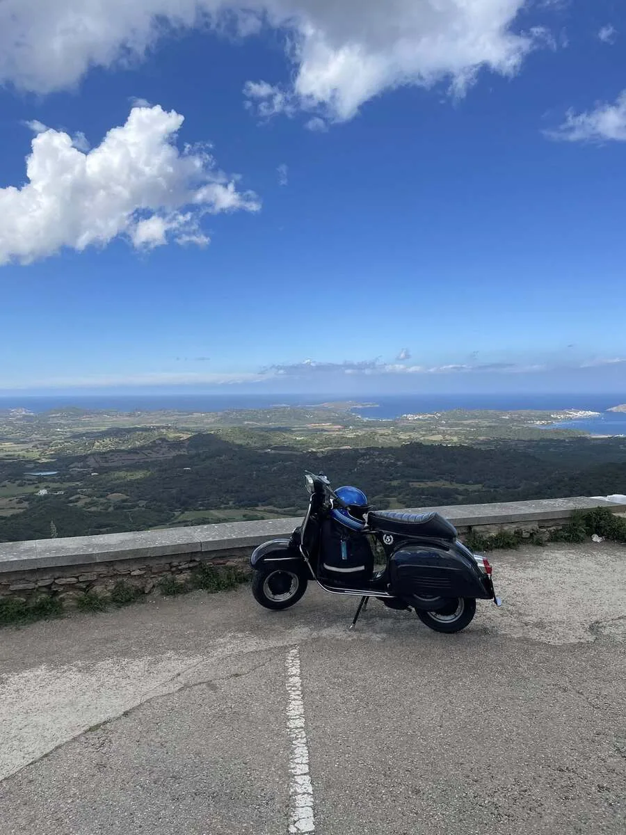 Valentina 1967 Vespa GS150 at El Toro viewpoint Menorca — highest point on the island with panoramic view over the island and sea