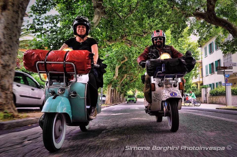 Markus Mayer and his ex-girlfriend riding Madalina and Rosinante through Pontedera Italy 2016 — photo by Simone Borghini Photoinvespa