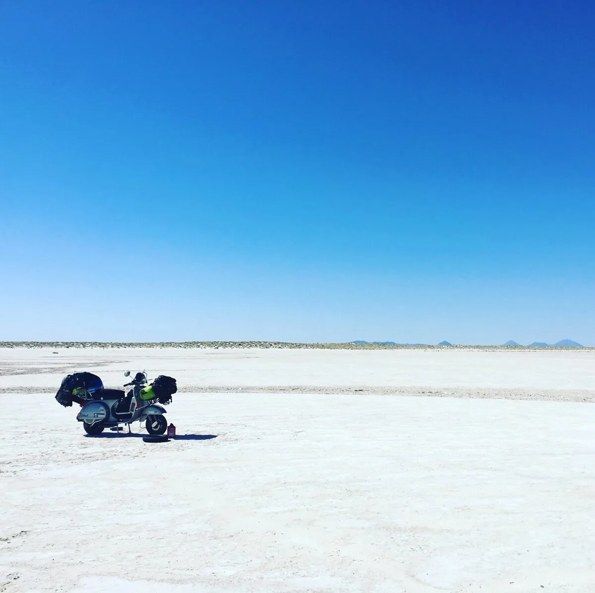 Vespa on the salt flats of Texas during USA Coast to Coast ride 2017