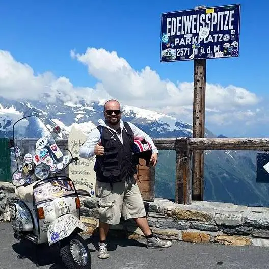 Markus André Mayer with Madalina the Vespa P200E at the Edelweissspitze 2,571m — Vespa Alp Days 2015