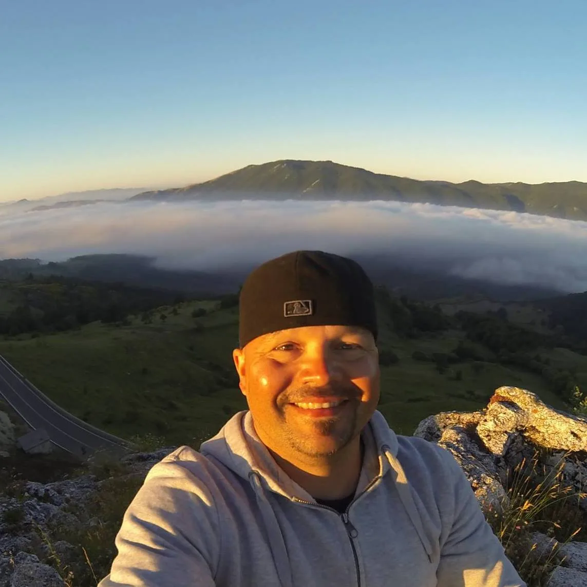 Markus André Mayer above the fog in the Italian mountains, 2014