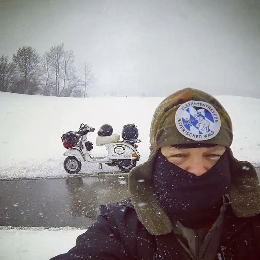 Markus André Mayer with Elefantentreffen hat and Vespa P200E Madalina in the snow 2015